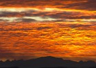 Sunset over the Black Hills with smoke from a wildfire.